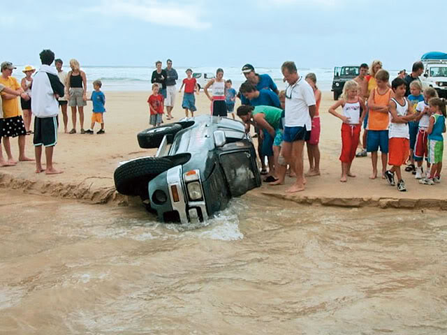 Name:  131_0704_15_ztoyota_4runnerstuck_beach_crowd.jpg
Views: 4118
Size:  64.2 KB