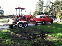 bigger tires..stock wheels-truck-tractor-riley-driving.jpg