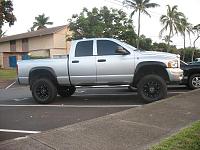 silver truck with black wheels-l_65a21b6b453f9e1f6576c3ae8de13027.jpg