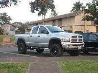 silver truck with black wheels-l_b9b7e58fdd43925b030b8901f5a79f78.jpg