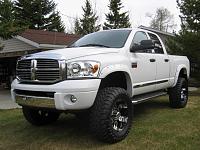 pics of lifted mega cabs and crew cabs please!!-dads-truck-2.jpg