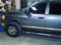 Pics of 4X4's with stock suspension and (whatever)  size tires.-dsc03511.jpg