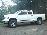 Pics of 4X4's with stock suspension and (whatever)  size tires.-dscn05802.jpg