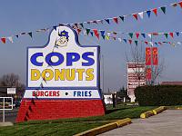 DTR Breakroom 12.13.09-12.19.09 (The same old breakroom with some flying stuff)-cops_donuts.jpg