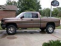 Pics of trucks with stock SLT rims and 285/305's-bfg285.jpg