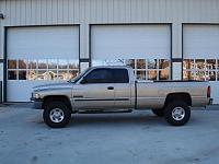 Pics of trucks with stock SLT rims and 285/305's-dsc00534fb1.jpg